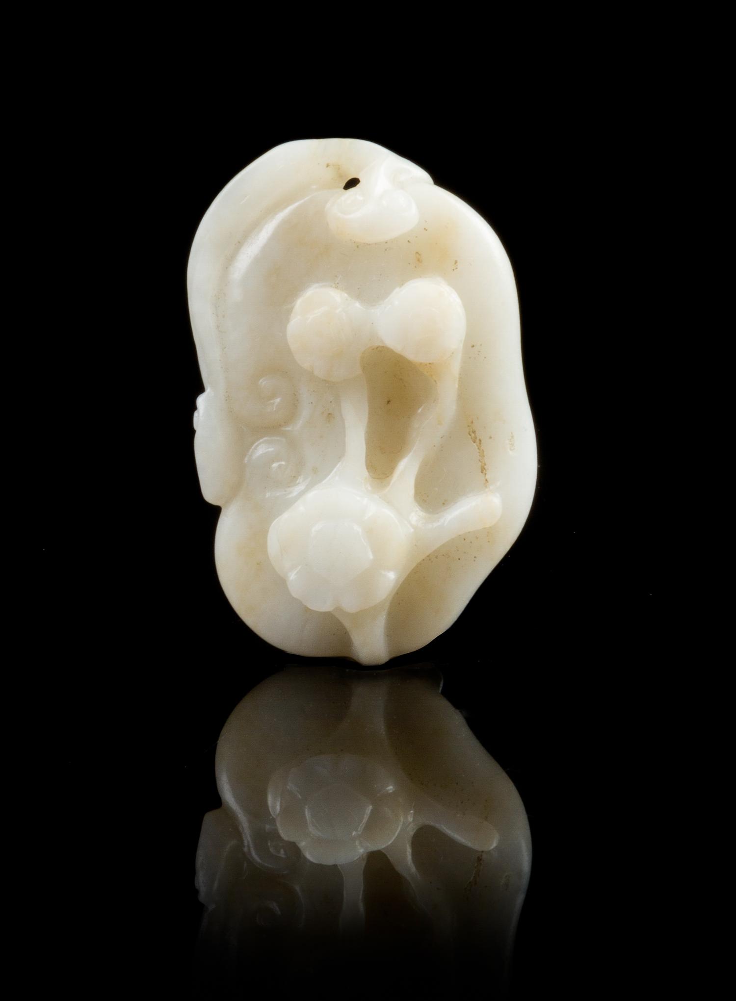 A Chinese Carved Jade Toggle 19TH CENTURY Width 1 7/8 inches. — 19TH CENTURY