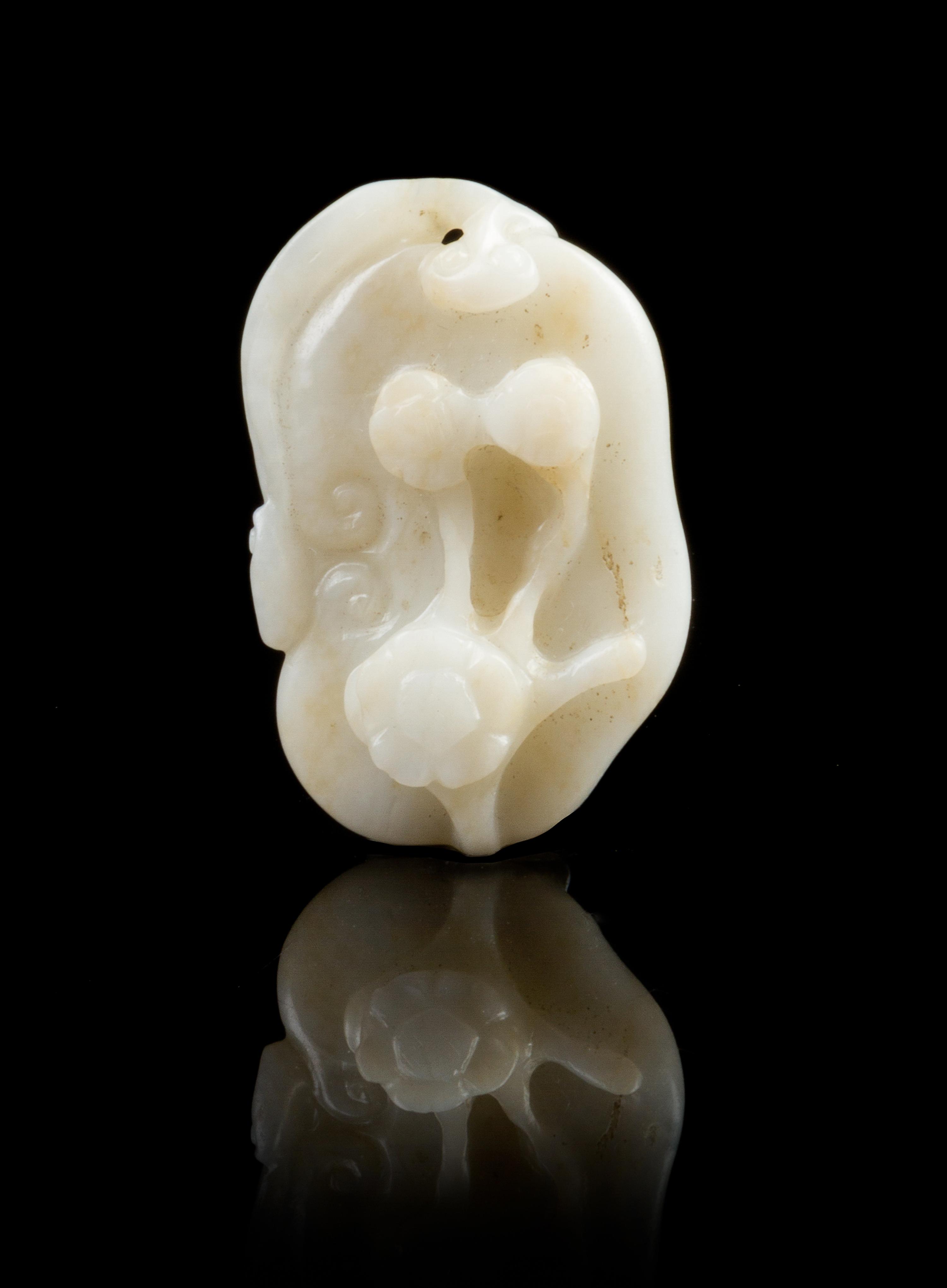 A Chinese Carved Jade Toggle 19TH CENTURY Width 1 7/8 inches. — 19TH CENTURY