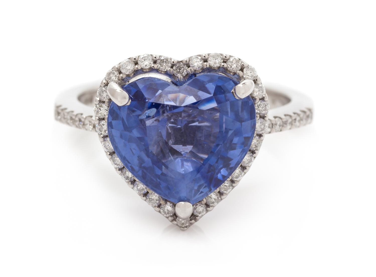 A 14 Karat White Gold, Sapphire and Diamond Ring, 3.50 dwts.
