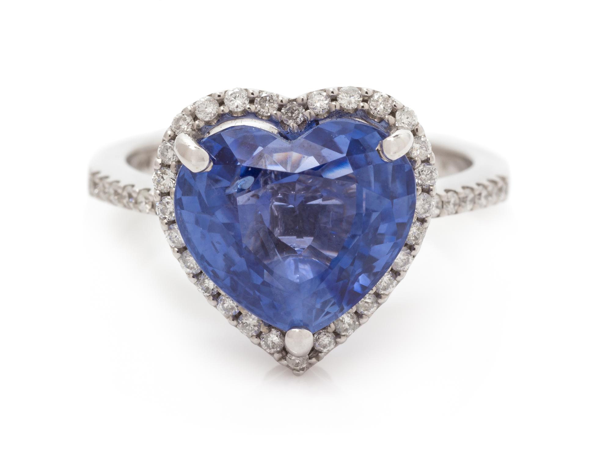 A 14 Karat White Gold, Sapphire and Diamond Ring, 3.50 dwts.