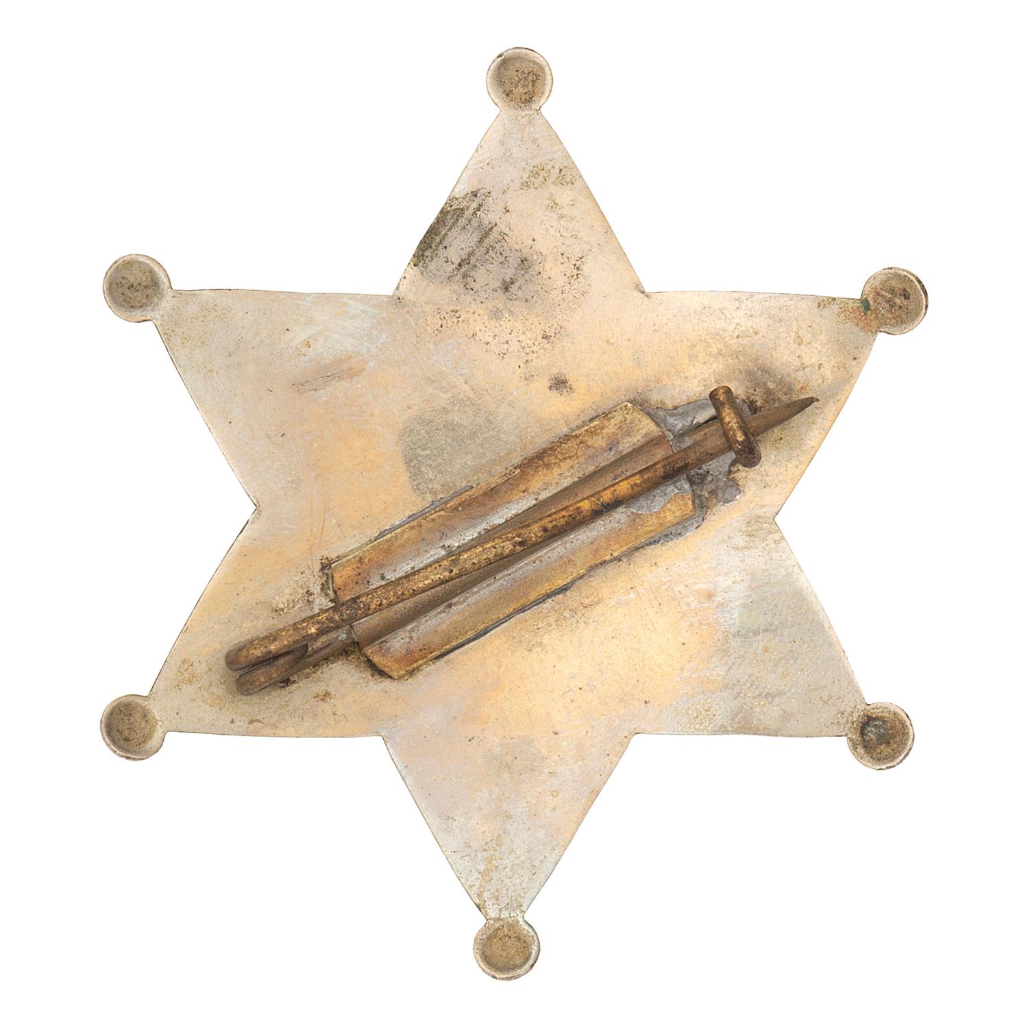 [WESTERN AMERICANA] -- [LAW ENFORCEMENT]. A group of 6 items, incl. buttons promoting sheriffs and "City Marshal" badge. N.p., n.d.