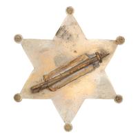 [WESTERN AMERICANA] -- [LAW ENFORCEMENT]. A group of 6 items, incl. buttons promoting sheriffs and "City Marshal" badge. N.p., n.d.