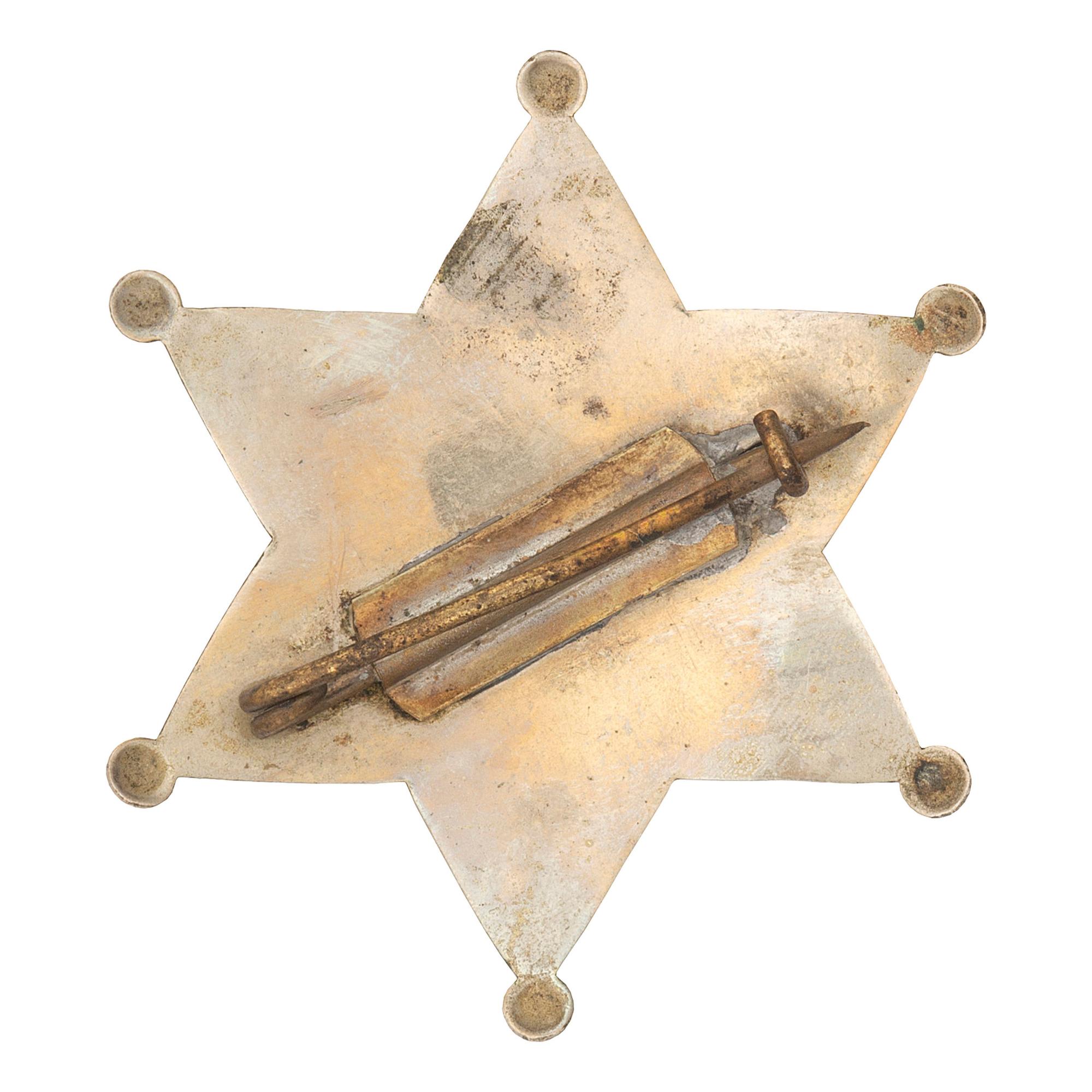 [WESTERN AMERICANA] -- [LAW ENFORCEMENT]. A group of 6 items, incl. buttons promoting sheriffs and "City Marshal" badge. N.p., n.d.