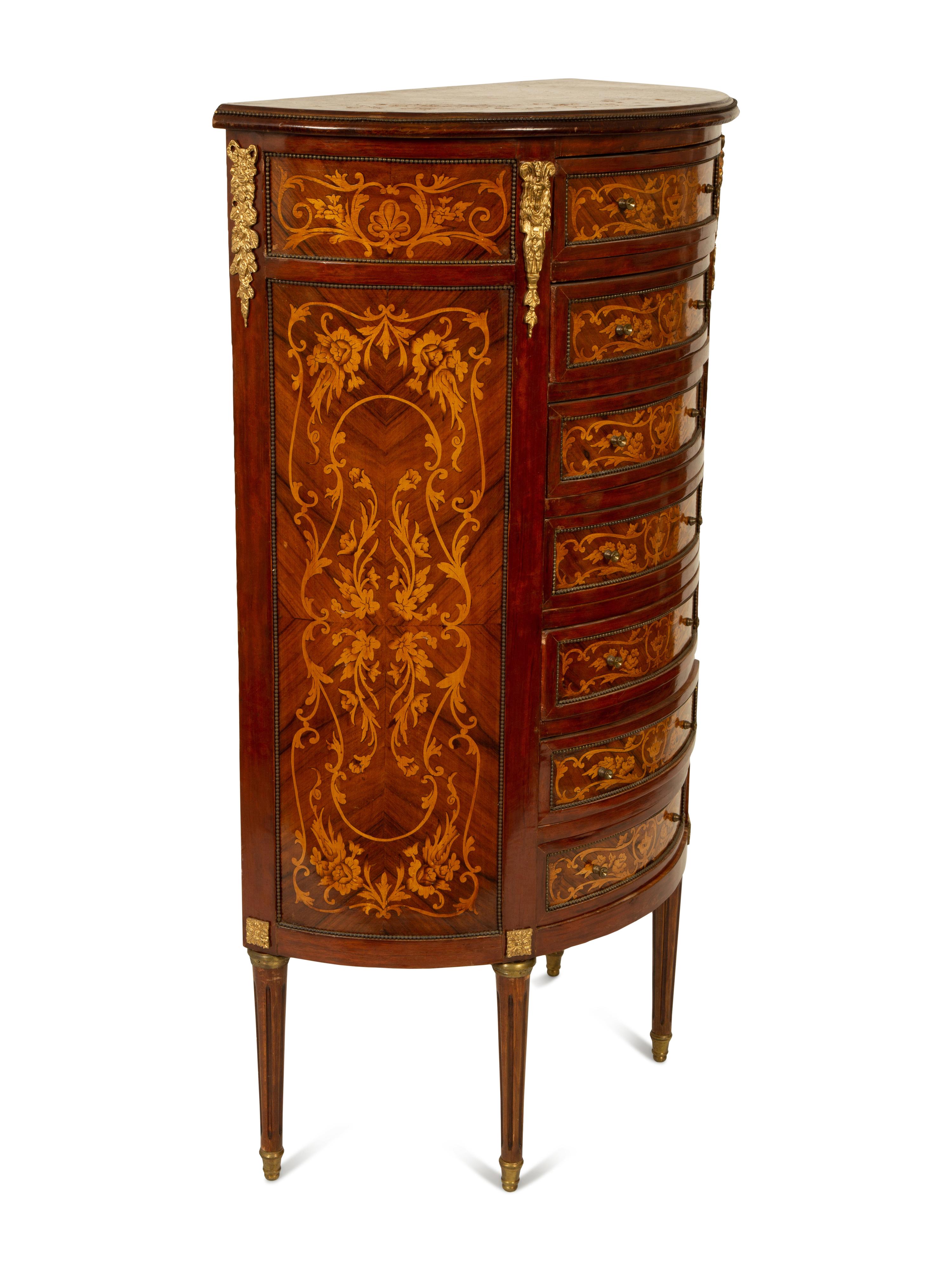 A Louis XVI Style Gilt Metal Mounted Marquetry Semainier