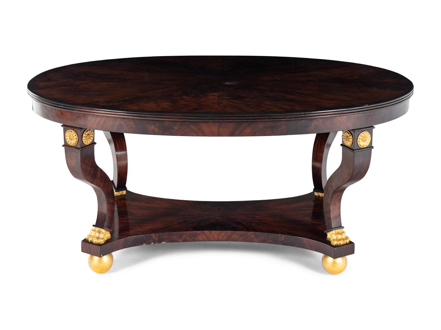 A Regency Style Parcel-Gilt Mahogany Center Table