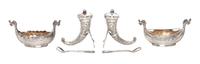Two Norwegian Silver Salt Sets, Magnus Aaes for David Andersen, each set comprising a boat form salt cellar with a glass liner, a spoon