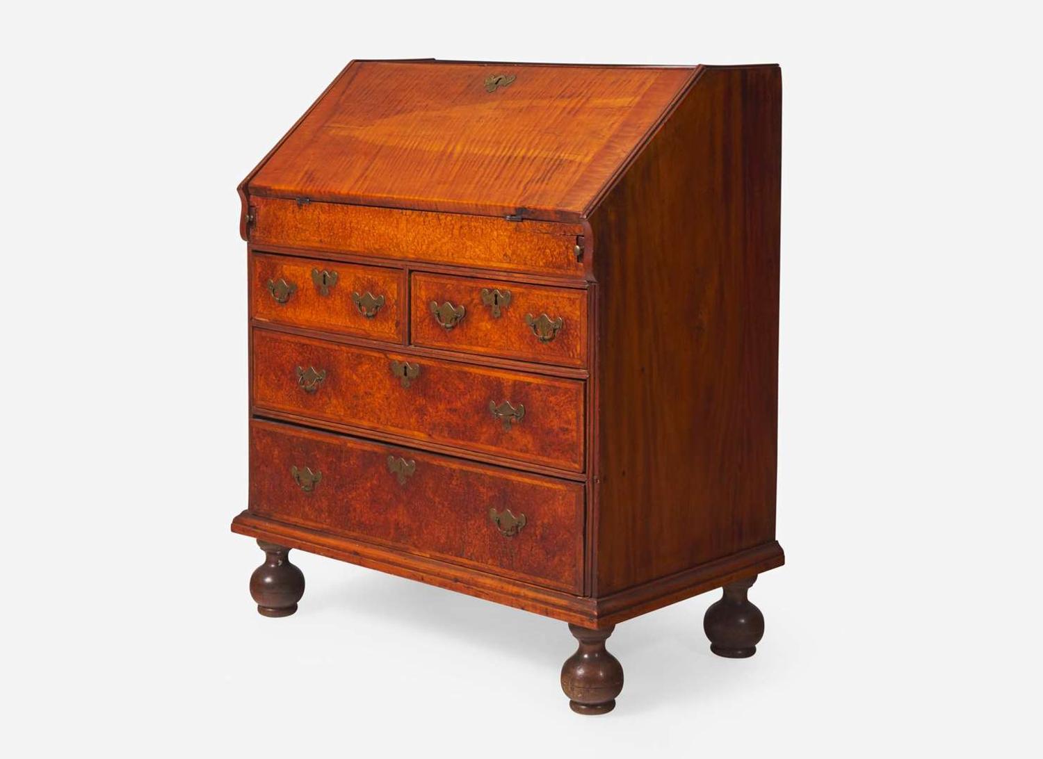 A William & Mary tiger maple and burl walnut veneered slant-front desk, New England, circa 1730