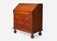 A William & Mary tiger maple and burl walnut veneered slant-front desk, New England, circa 1730