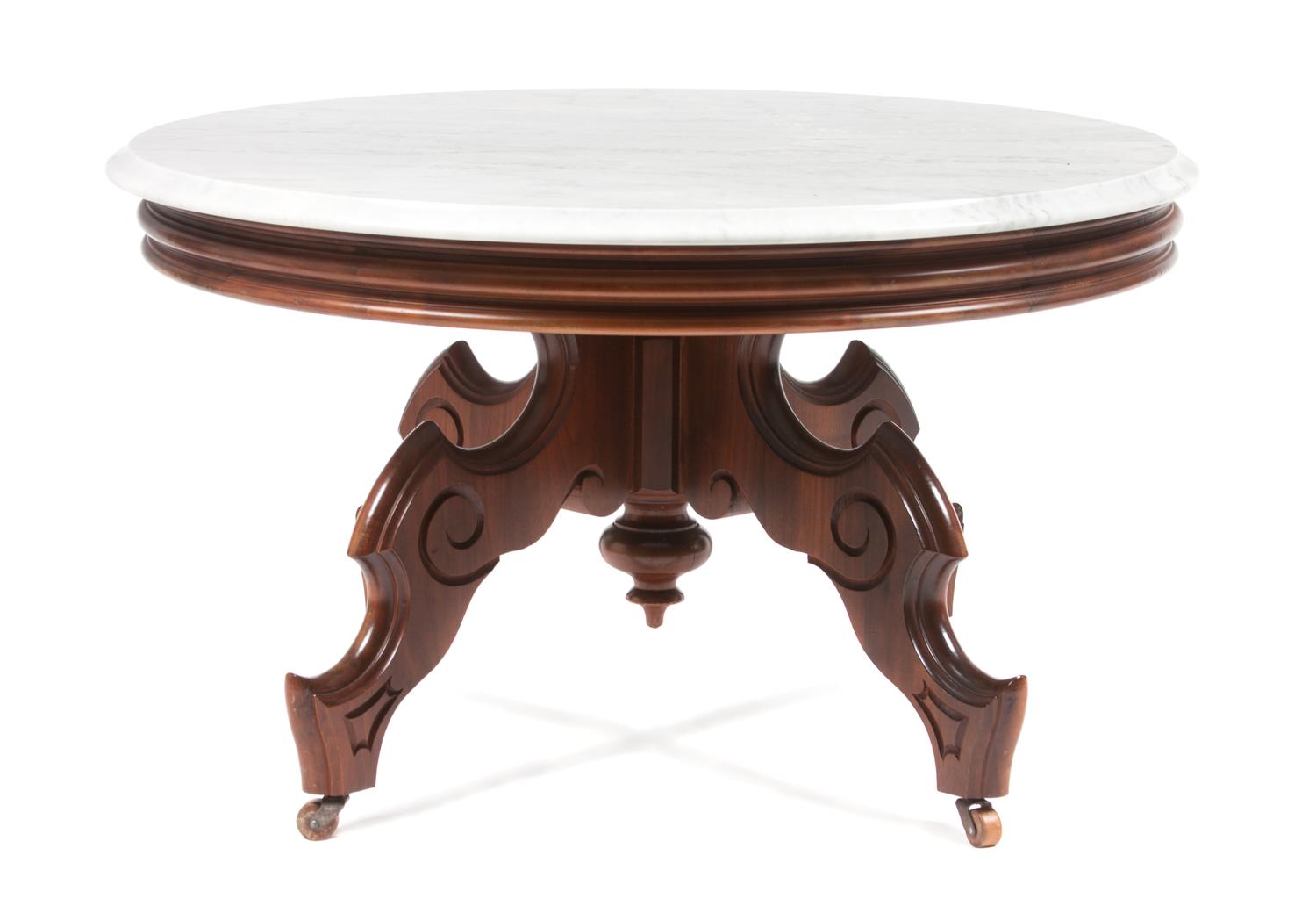 A Victorian Walnut Center Table Height 19 1/4 x diameter 33 inches. — 19TH CENTURY, WITH ALTERATION