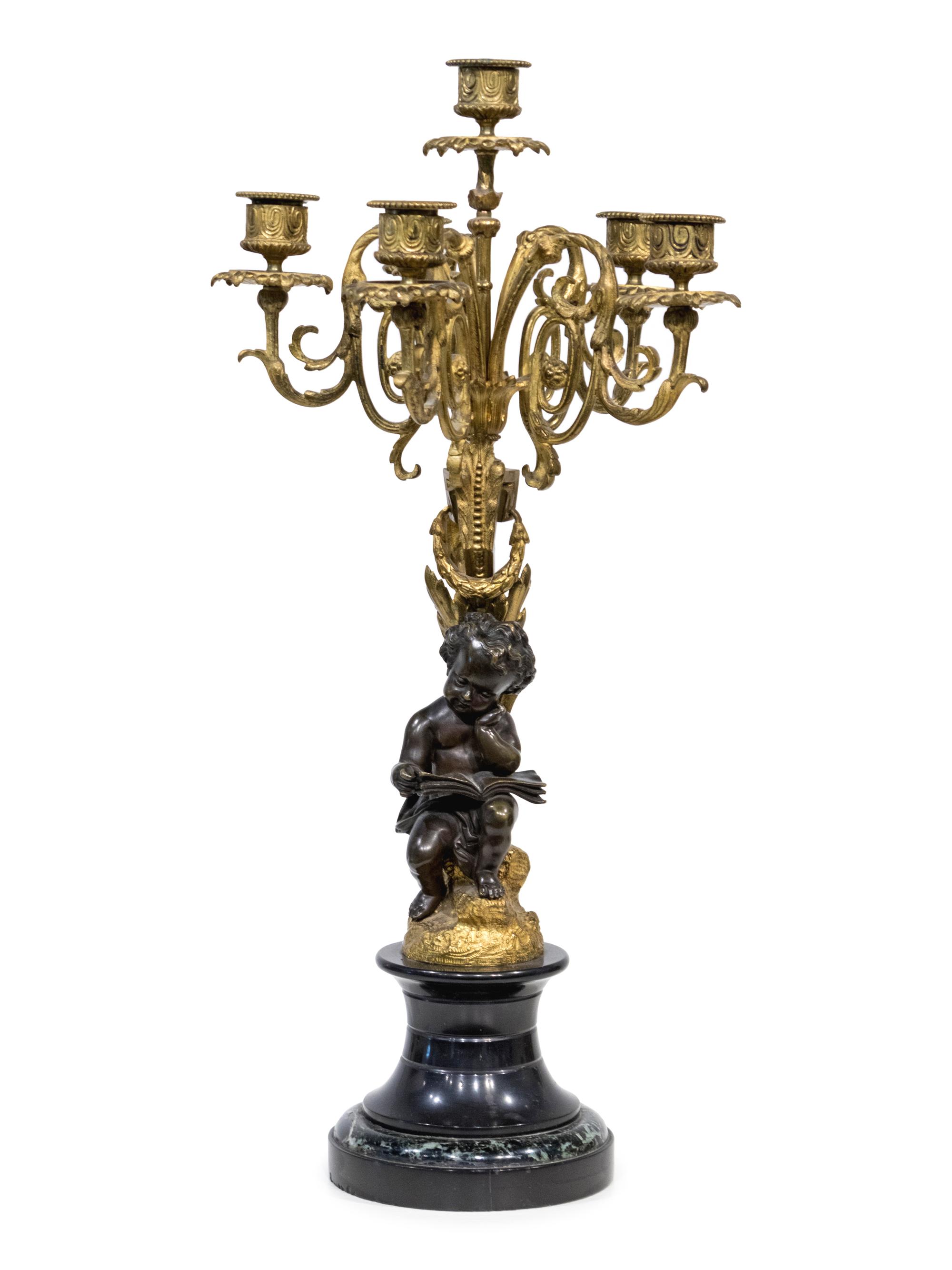 A Louis XV Style Parcel-Gilt and Patinated Bronze Candelabrum