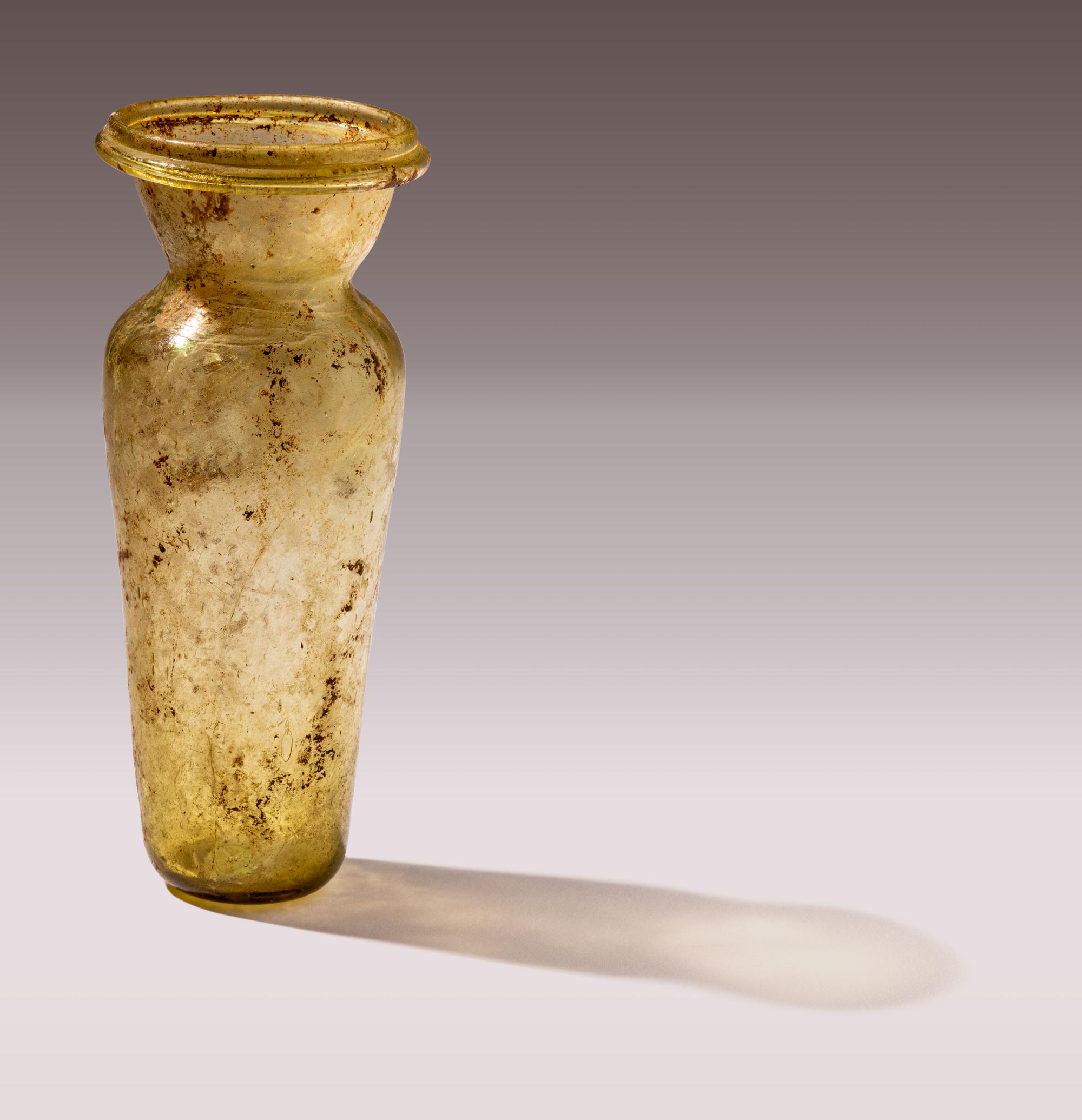 A Roman Yellow-Green Glass Amphoriskos
