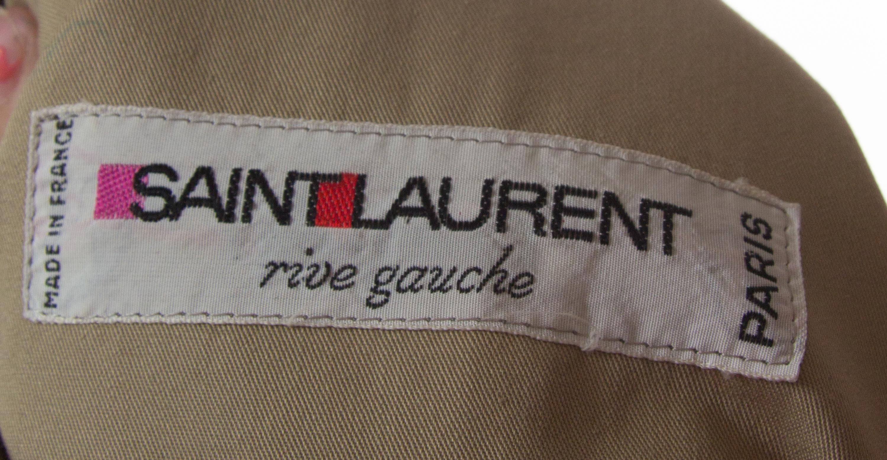 An Yves Saint Laurent Double Breasted Trench Coat,