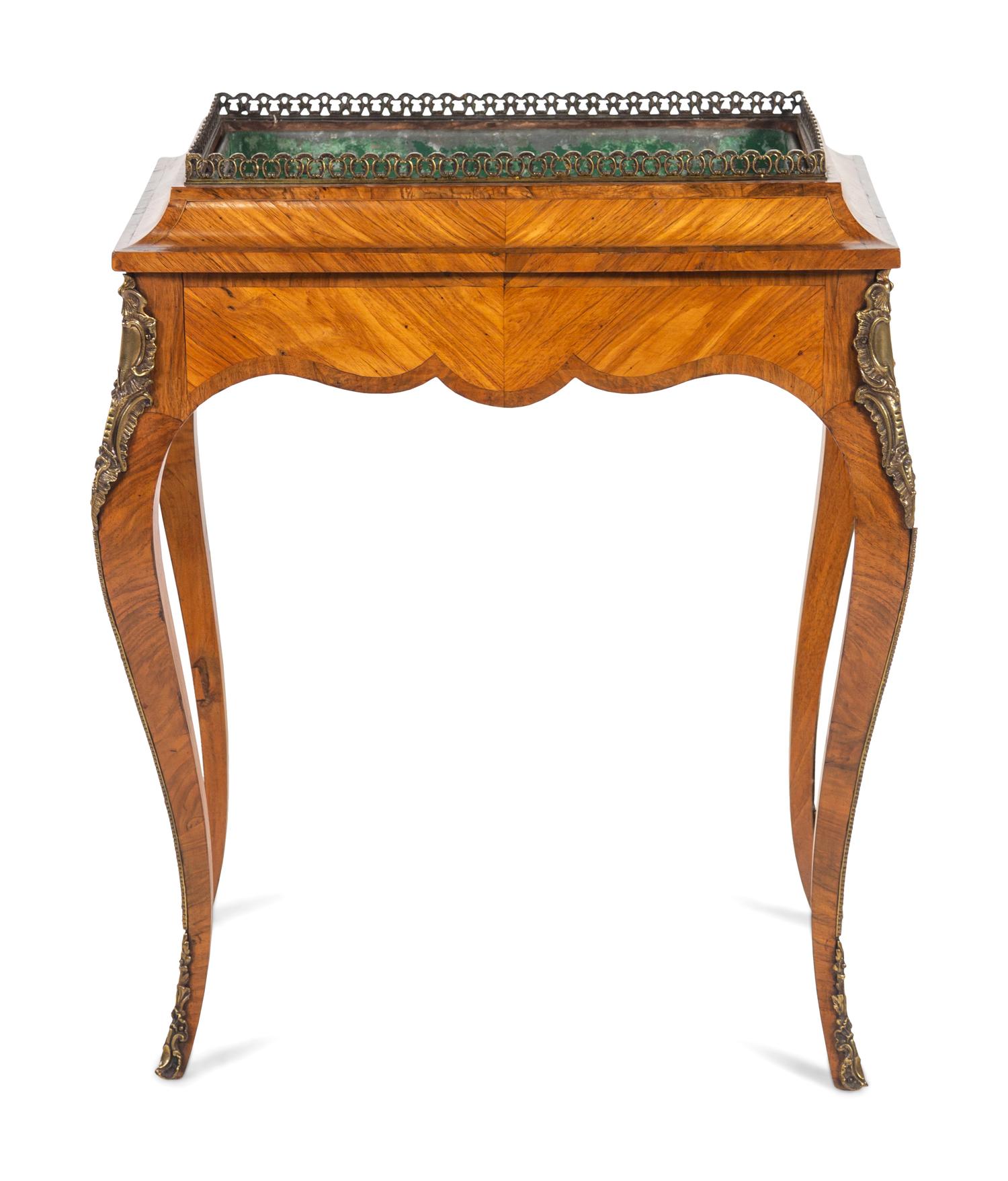 A Louis XV Style Gilt Bronze Mounted Kingwood Jardinière Stand