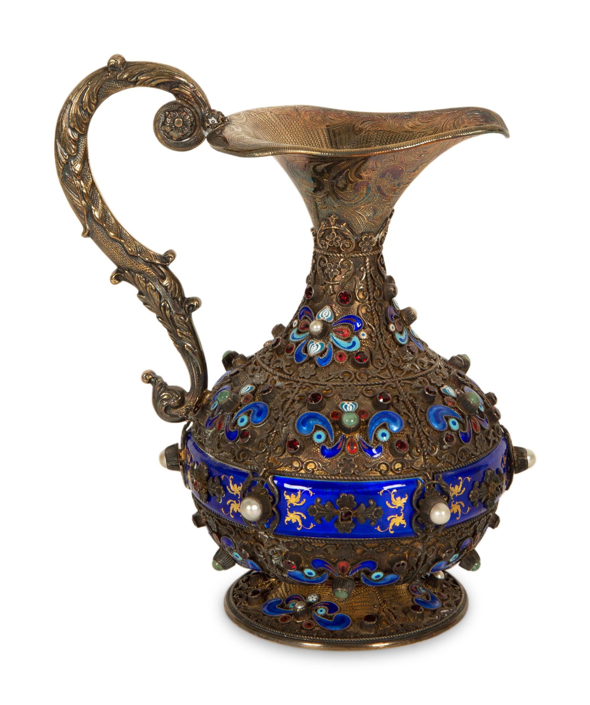 A Continental Enameled and Gem-Encrusted Silver-Gilt Wine Ewer