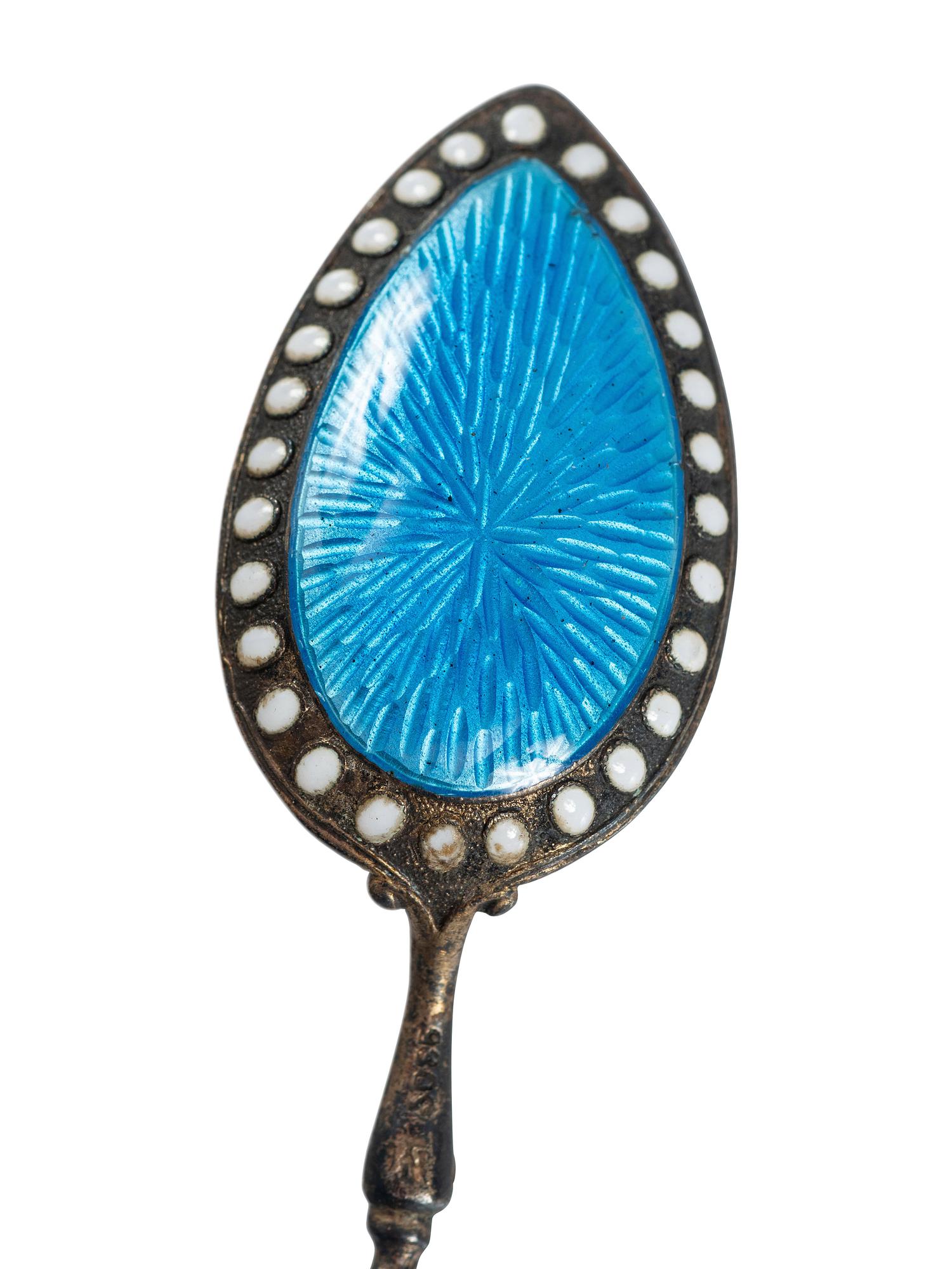 Sixteen Russian Silver and Enamel Spoons