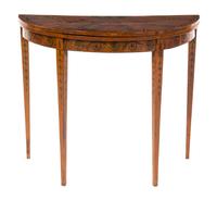 An Edwardian Satinwood Games Table, Height 29 1/2 x width 36 x depth 18 inches (closed).