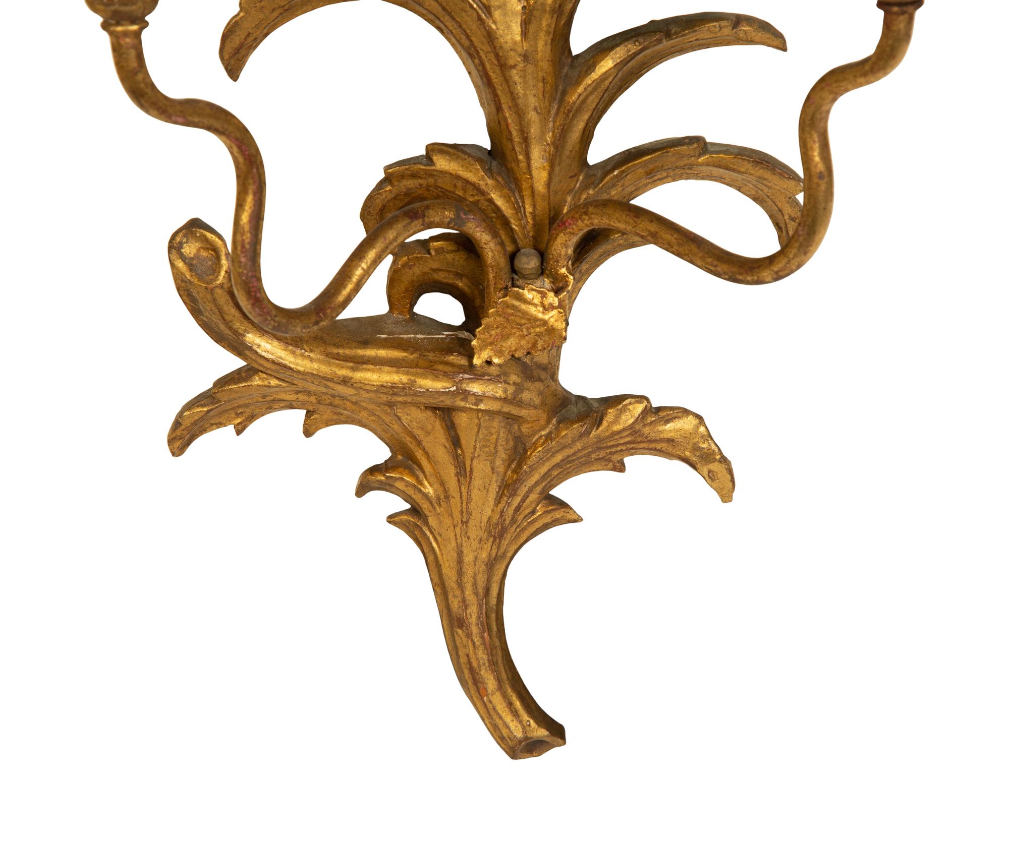 A Pair of Italian Carved Giltwood Two-Light Sconces