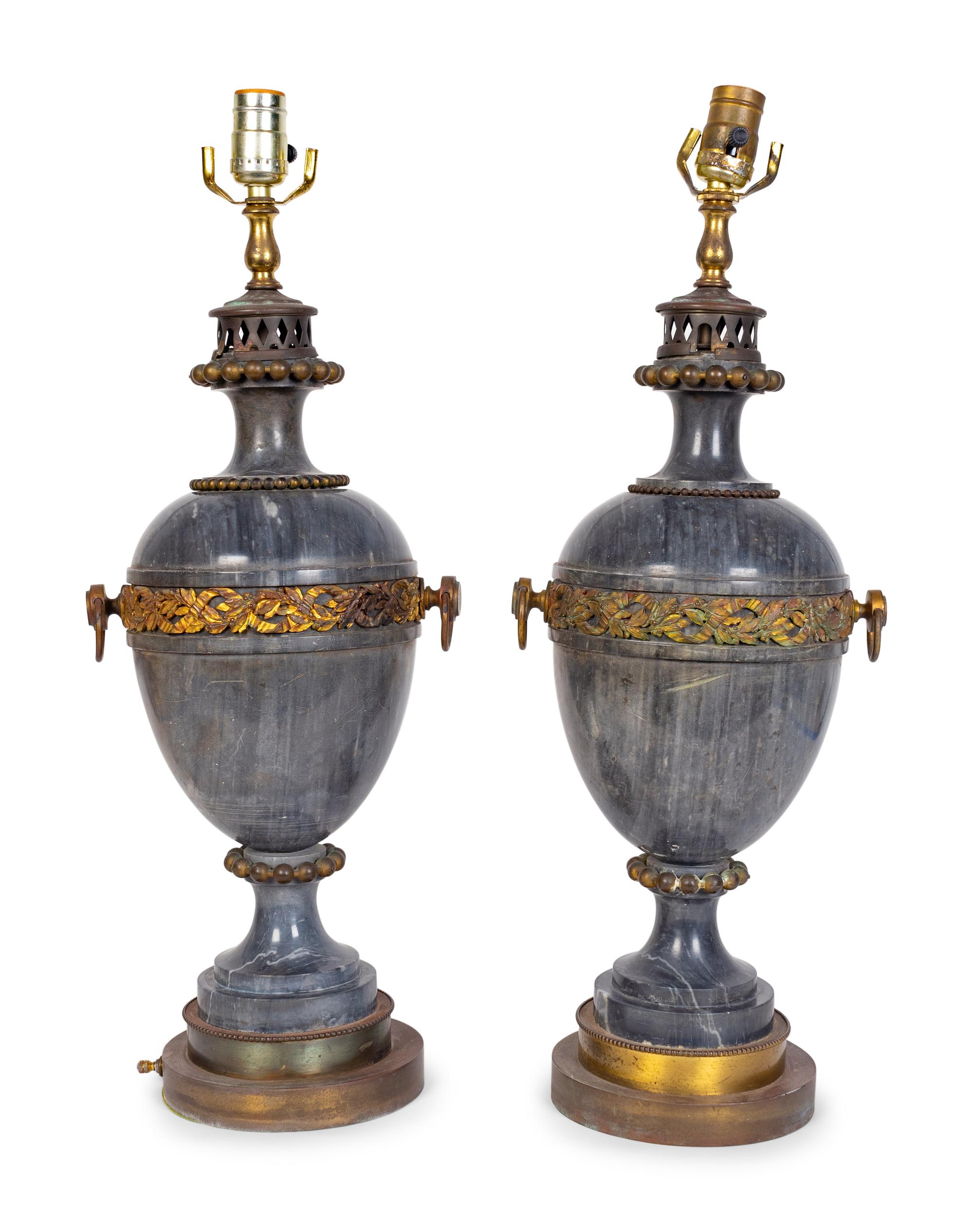A Pair of Gilt Metal Mounted Grey Marble Urns — 20TH CENTURY