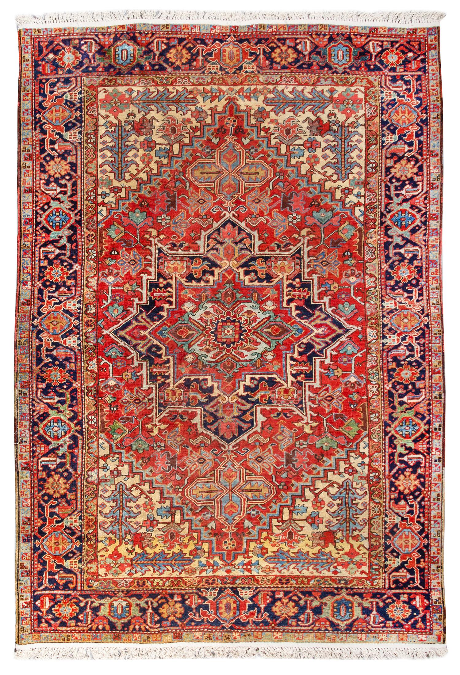 A Heriz Wool Rug 9 feet 1 inch x 6 feet 5 inches. — EARLY 20TH CENTURY