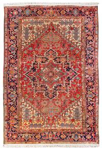A Heriz Wool Rug 9 feet 1 inch x 6 feet 5 inches. — EARLY 20TH CENTURY