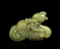 A Chinese Green Jade Figure of a Phoenix Length 3 inches. — 20TH CENTURY