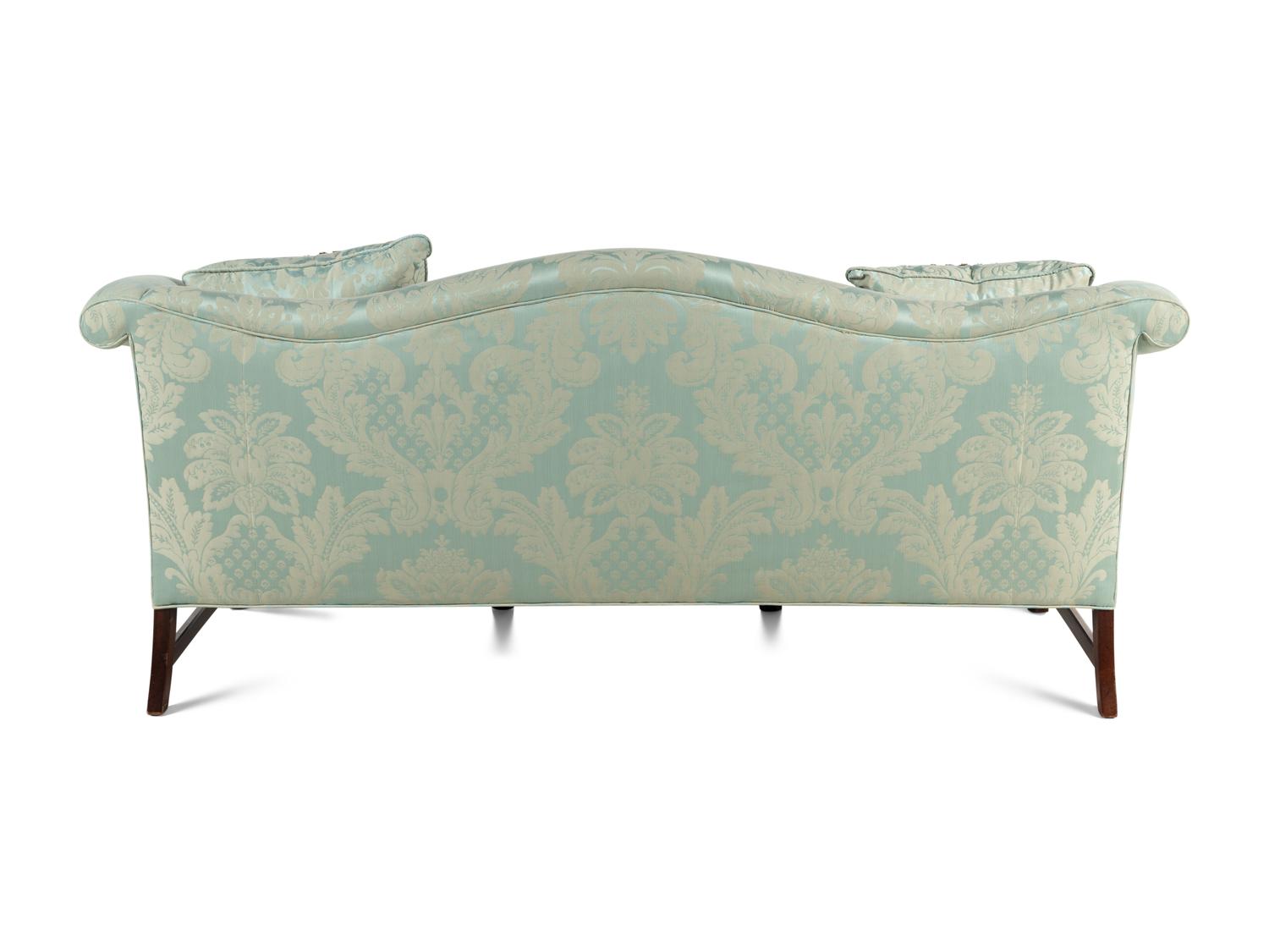 A Georgian Style Damask Upholstered Camelback Sofa