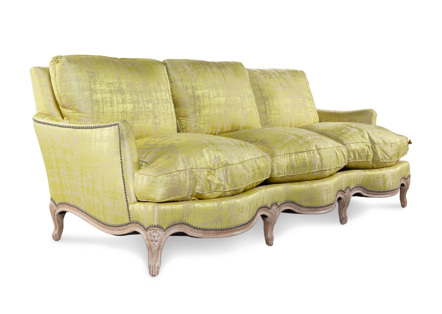 A Louis XV Style Cerused Silk Upholstered Sofa