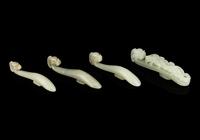 Four Chinese Celadon Jade 'Chilong' Belt Hooks