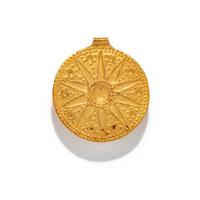 A Near Eastern Gold Disk Pendant