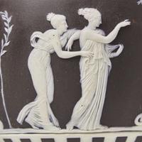 A Pair of Wedgwood Black Dip Jasperware and Black Basalt "Panther" Vases UK, late 19th century