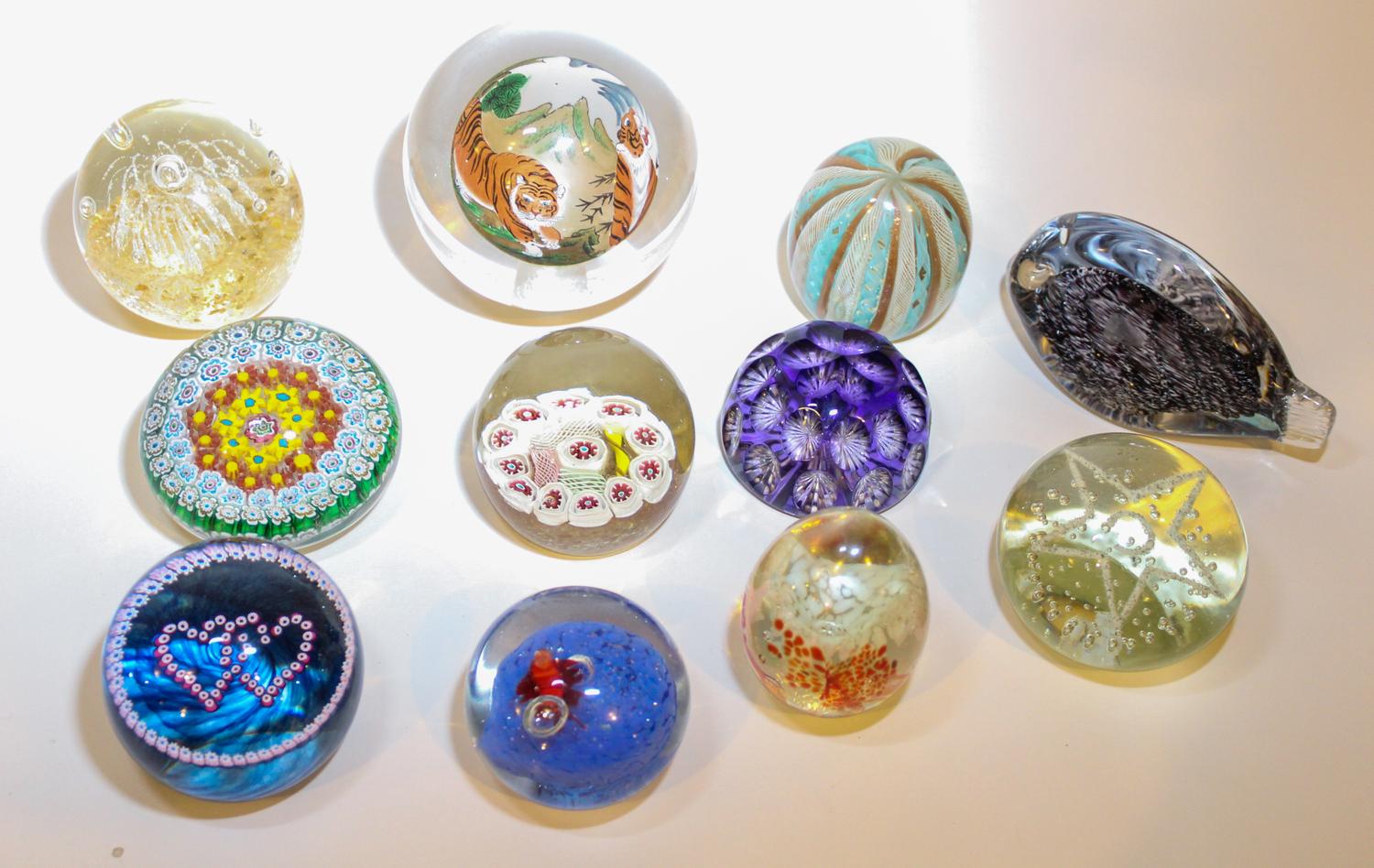 Eleven Glass Paperweights. Diameter of largest 4 1/2 inches.