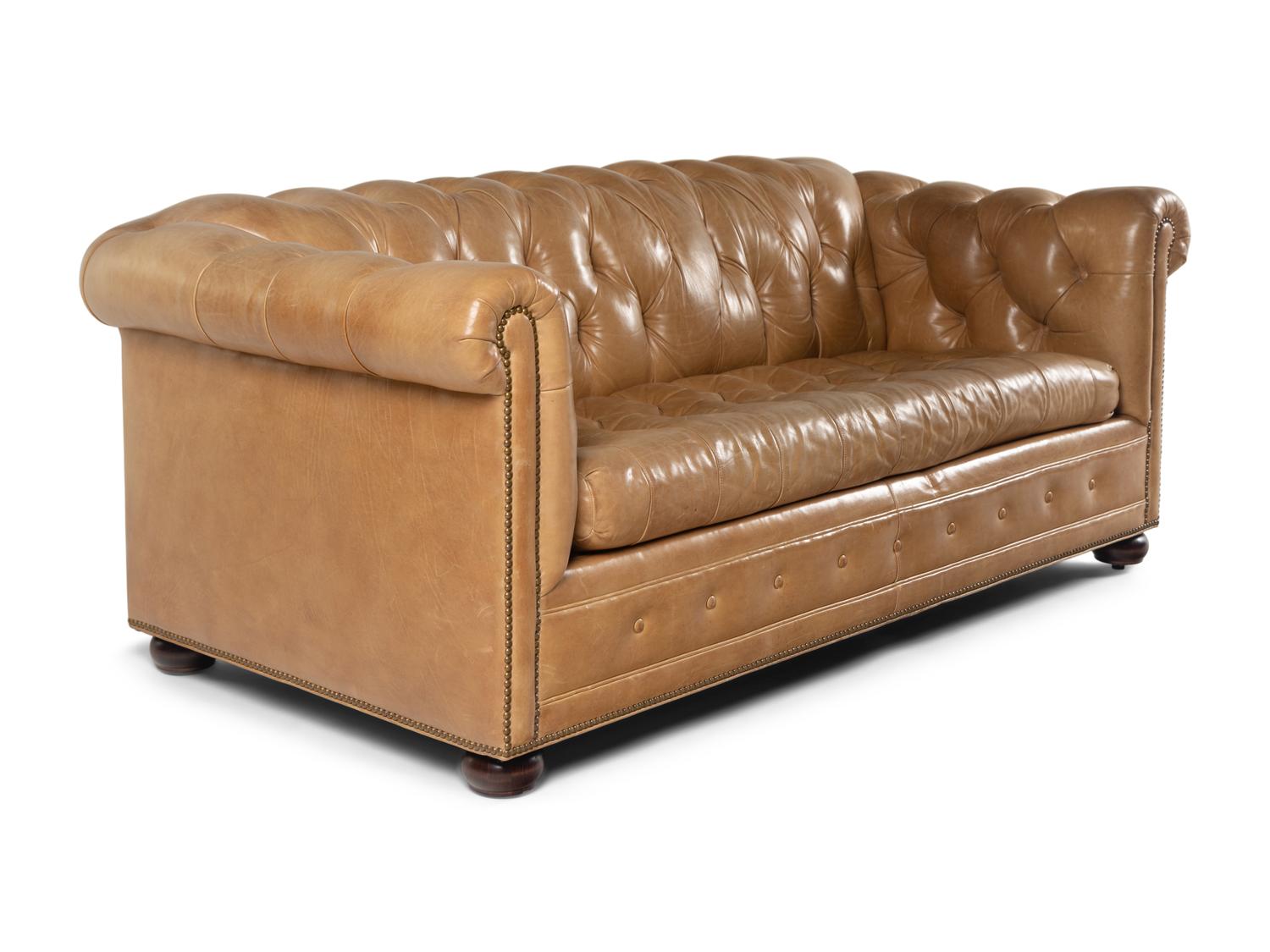 A Leather Upholstered Chesterfield Convertible Sofa