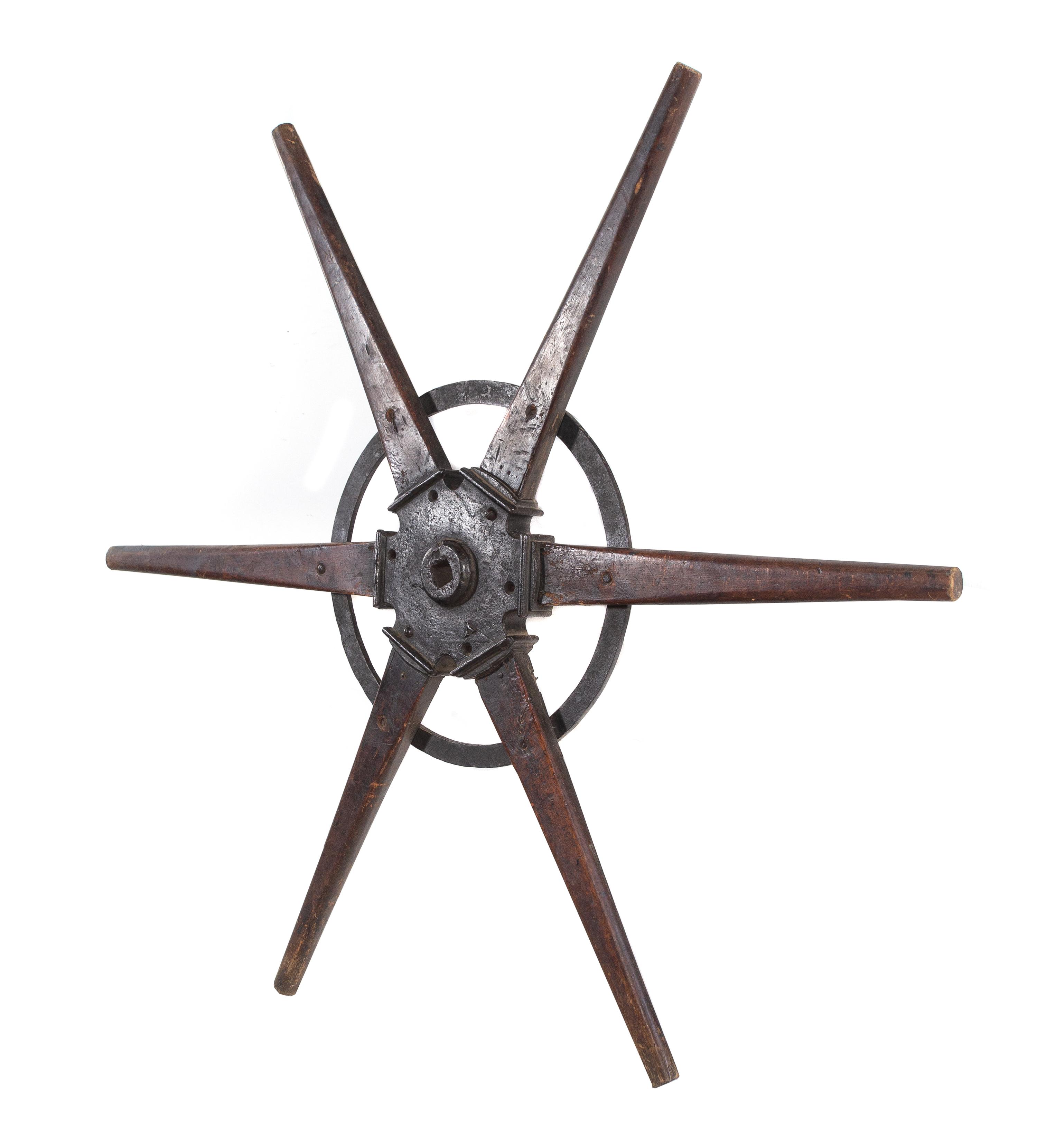 An Iron Mounted Mahogany Ship's Wheel