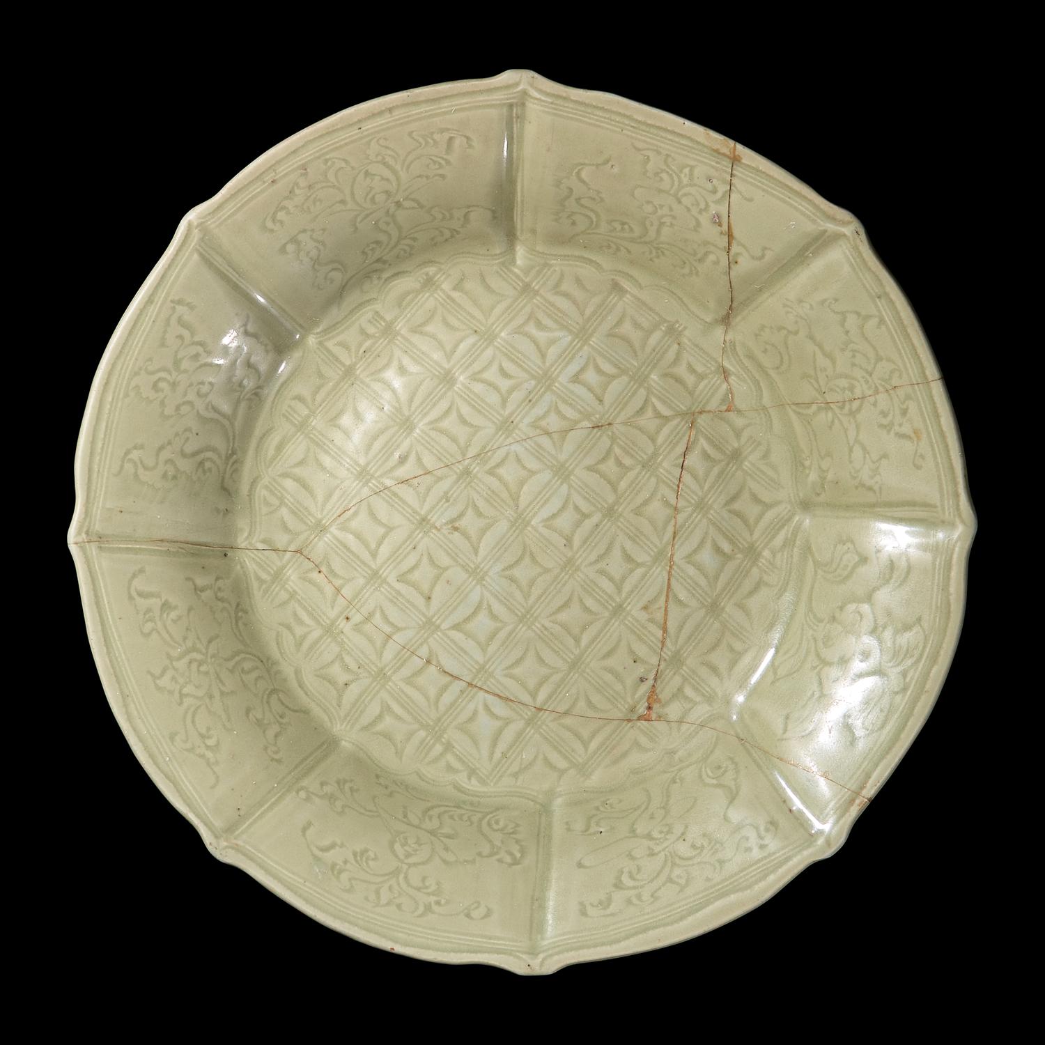 An Unusual Large Chinese Longquan Celadon Carved Barbed Charger, Ming Dynasty 明 龍泉青瓷花形大盤