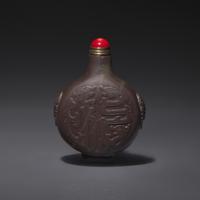 A Chinese Carved Duan Stone Snuff Bottle, Qing Dynasty, Circa 1800-1850 — 1800–1850年 端石雕龍紋鼻煙壺