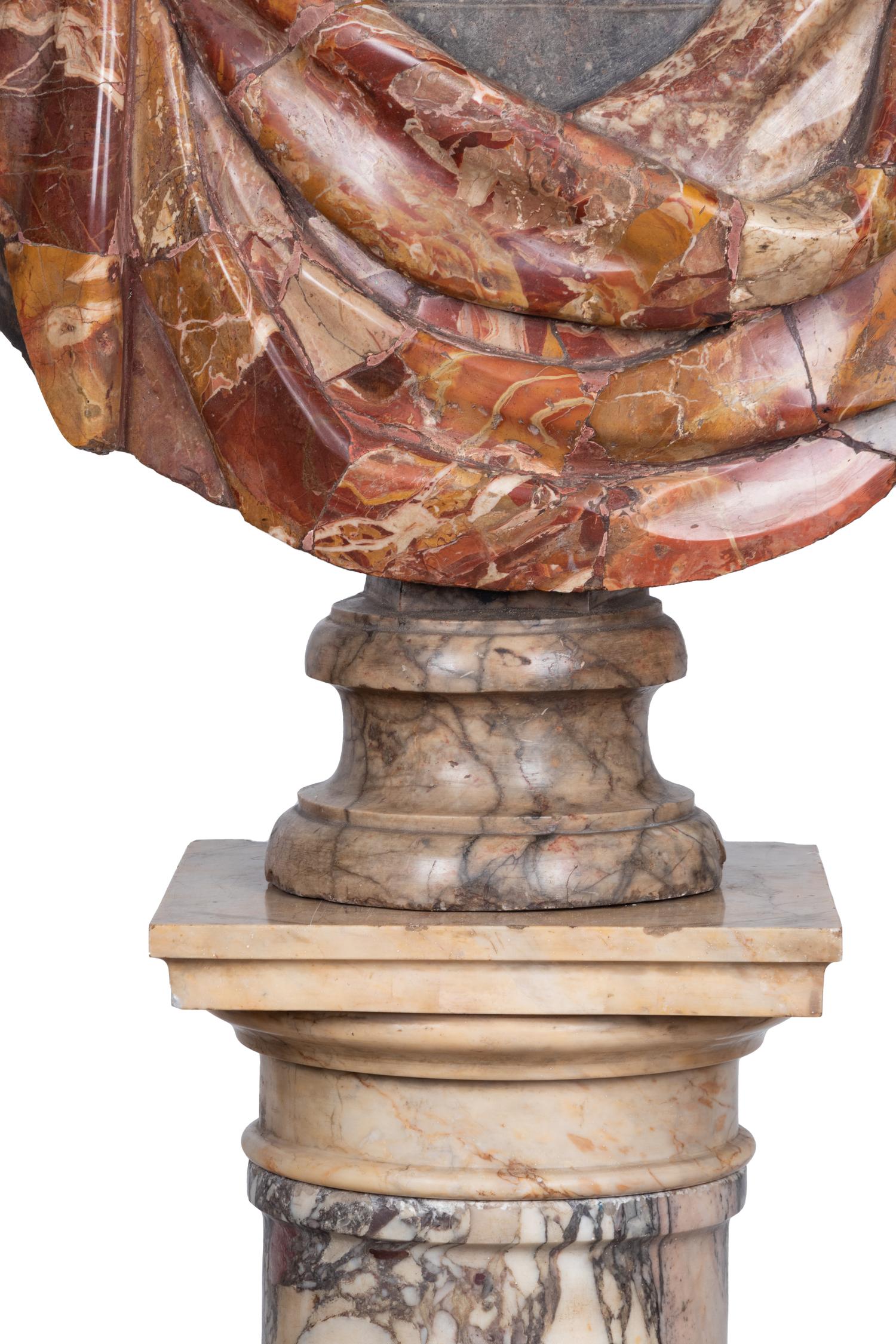 A Mixed Marble Portrait Bust of Caracalla with a Continental Marble Column
