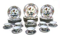 An Italian Ceramic Partial Dinner Service Diameter of largest 11 inches. — 20TH CENTURY