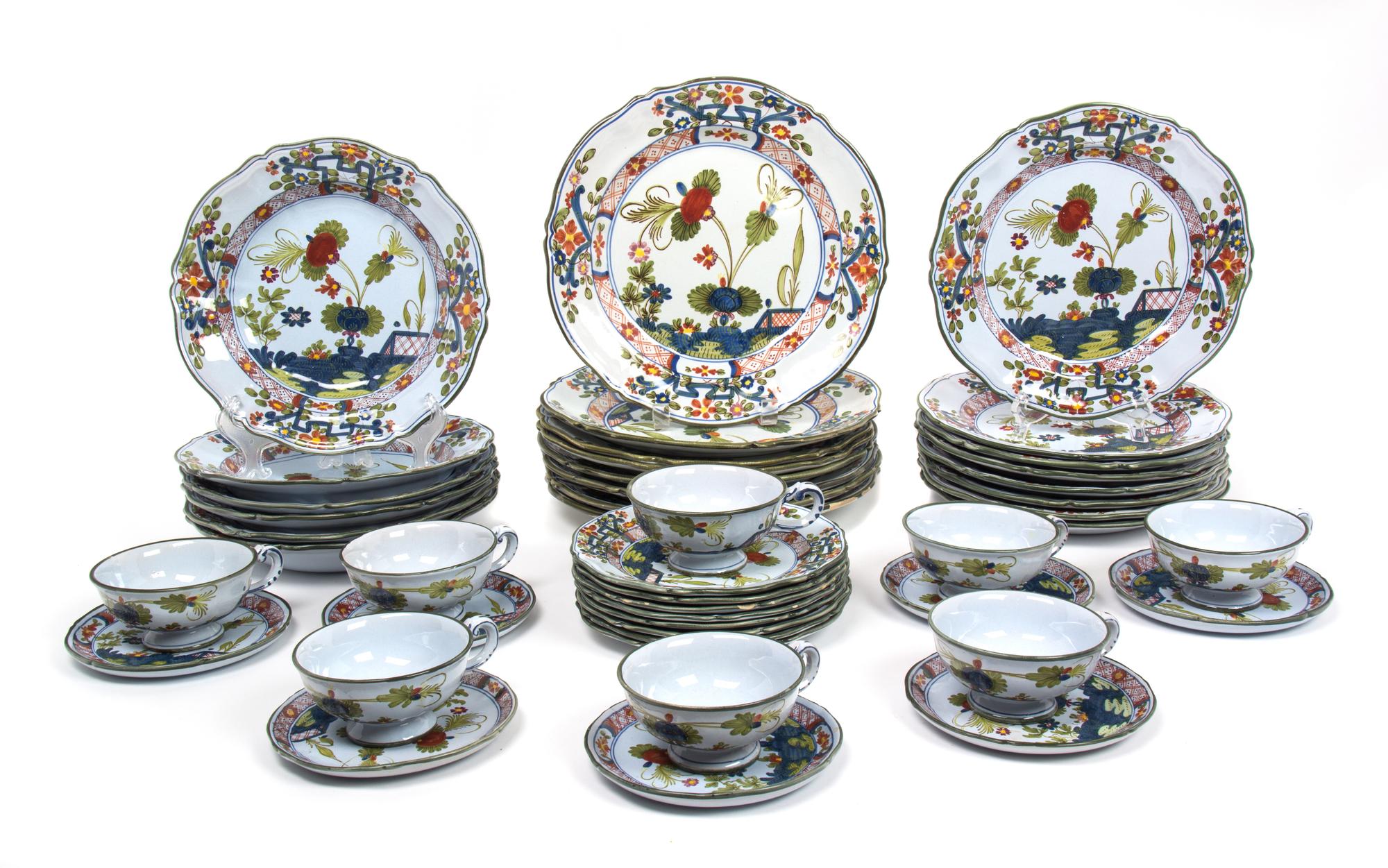 An Italian Ceramic Partial Dinner Service Diameter of largest 11 inches. — 20TH CENTURY
