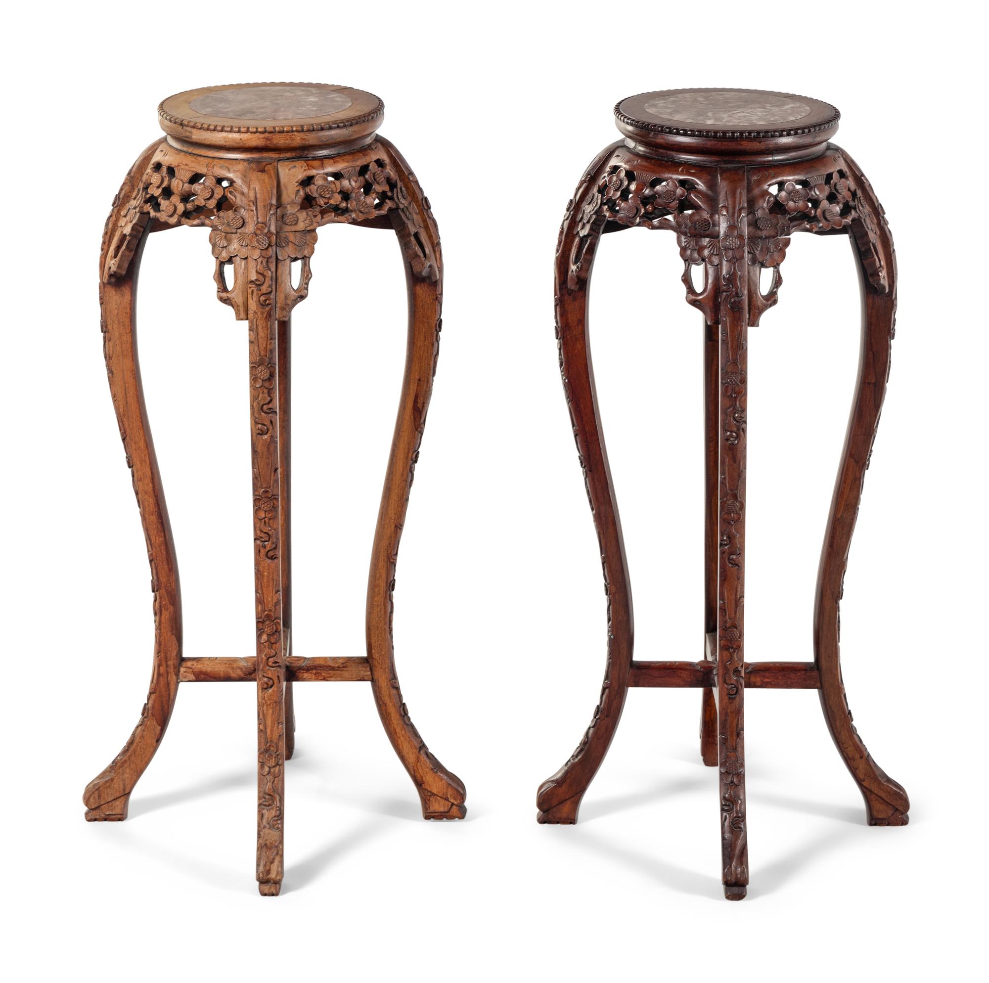 A Pair of Chinese Carved Hardwood Pedestals