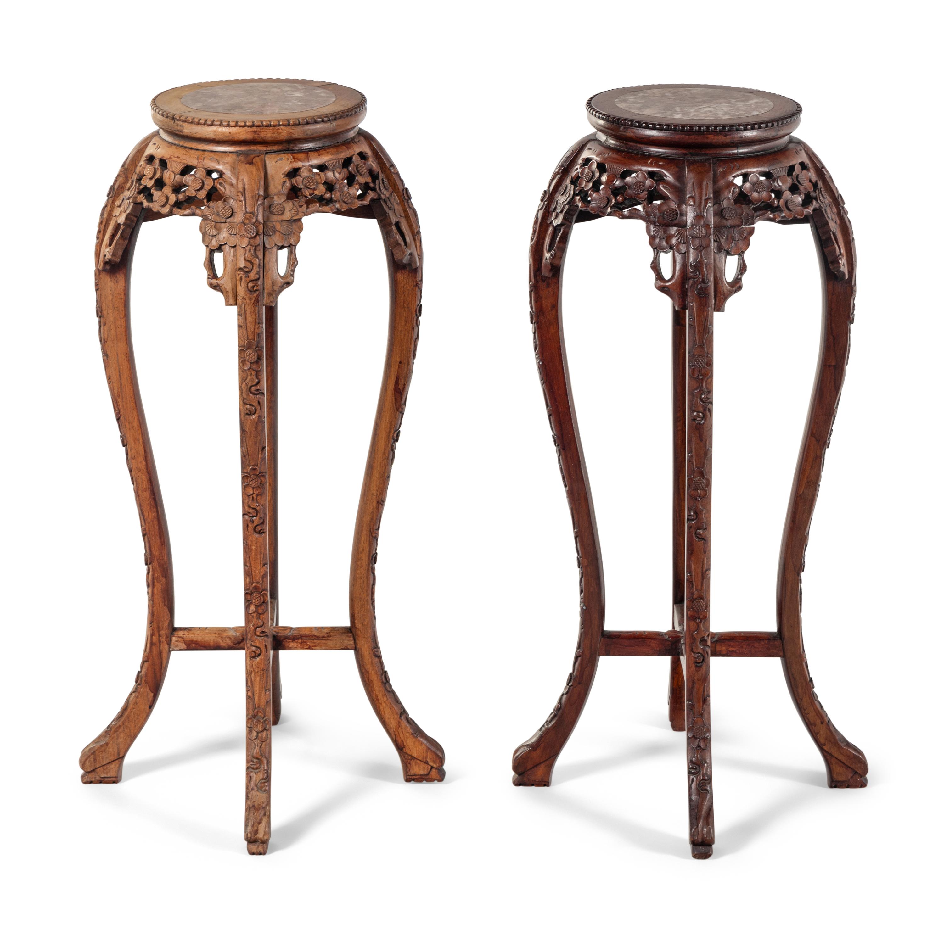A Pair of Chinese Carved Hardwood Pedestals