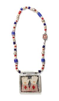 A Trade Bead Presentation Box Necklace Length 20 inches; pendant 3 1/2 x 3 1/2 inches.