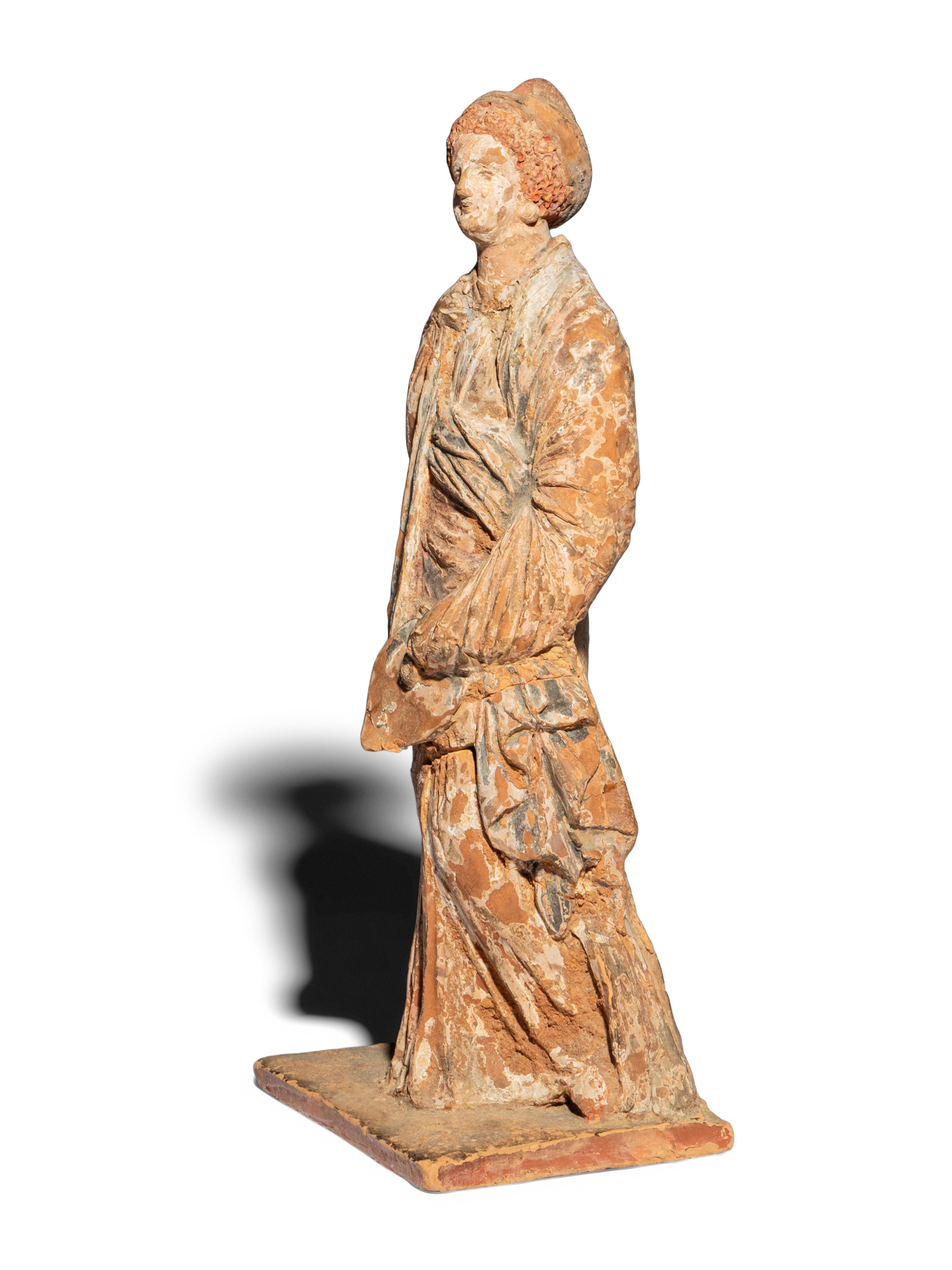 A Neoclassical Terracotta Tanagra Figure