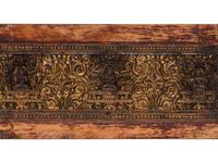A Tibetan Gilt Lacquered and Polychromed Wood Manuscript Cover