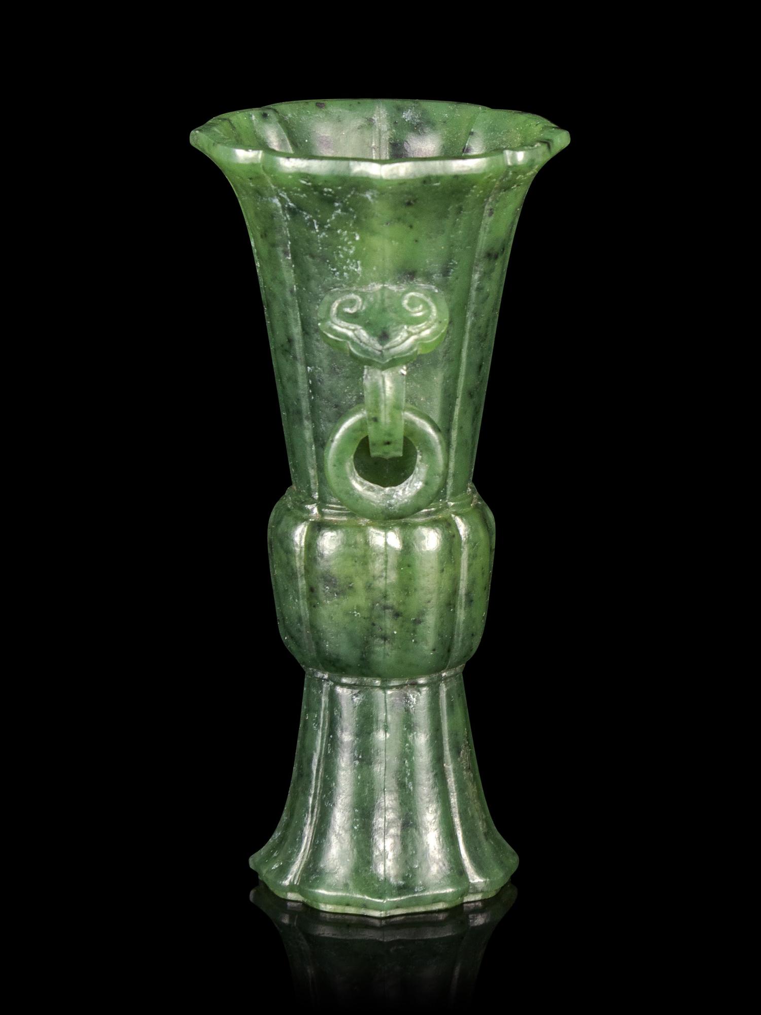 A Carved Spinach Jade Gu Vase