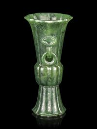 A Carved Spinach Jade Gu Vase