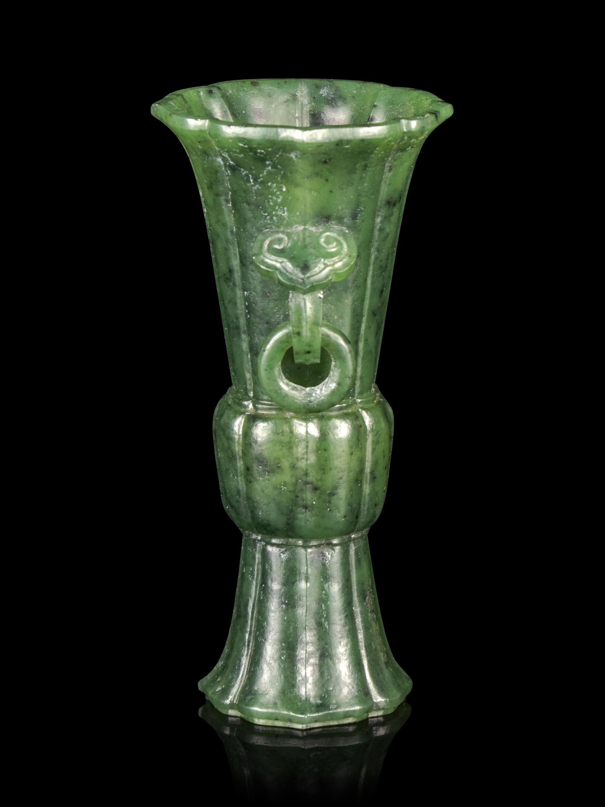 A Carved Spinach Jade Gu Vase