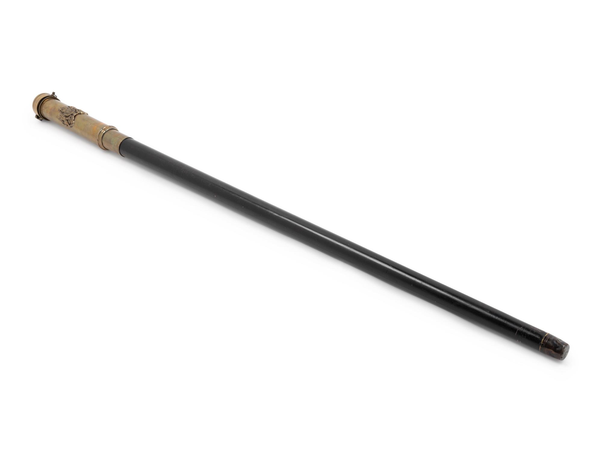 An English Silvered Metal Mounted Brass 'Dieu et mon Droit' Explorer's Walking Stick