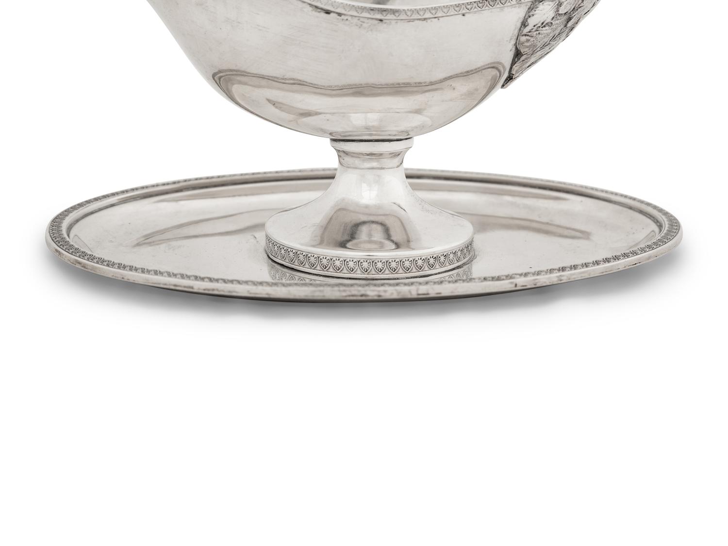 An Austro-Hungarian Silver Sauce Boat with Attached Undertray