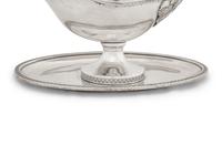 An Austro-Hungarian Silver Sauce Boat with Attached Undertray