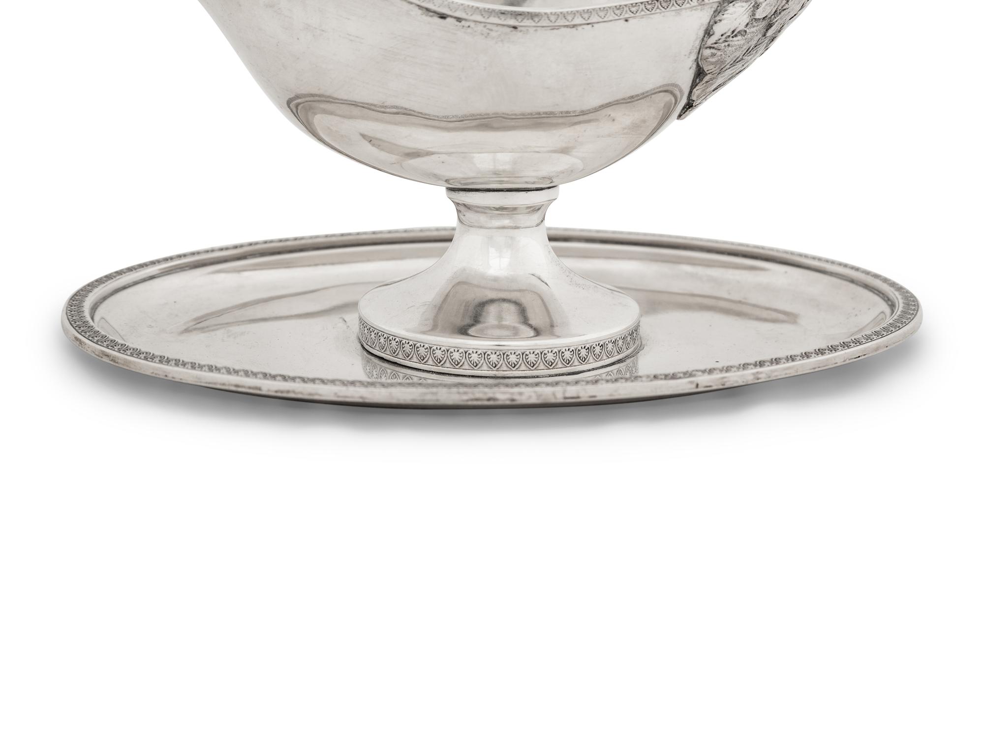 An Austro-Hungarian Silver Sauce Boat with Attached Undertray